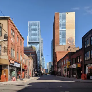 City street lined with shops and apartment buildings